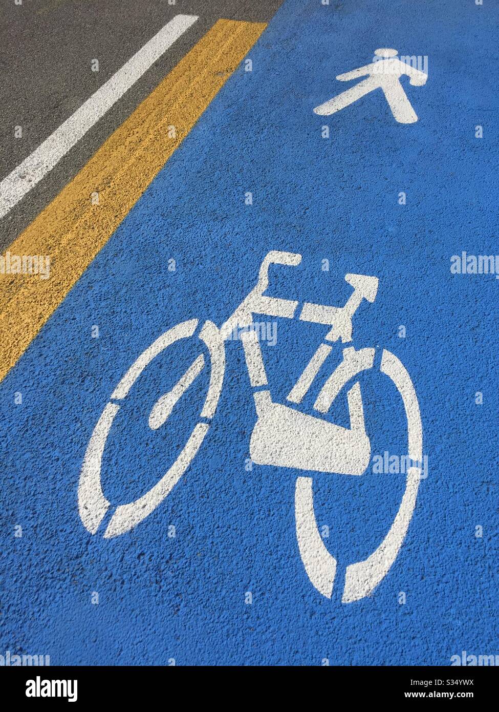 Italy, Lombardy, Bicycle Road Sign on Asphalt - Smartphone Captured Stock Image