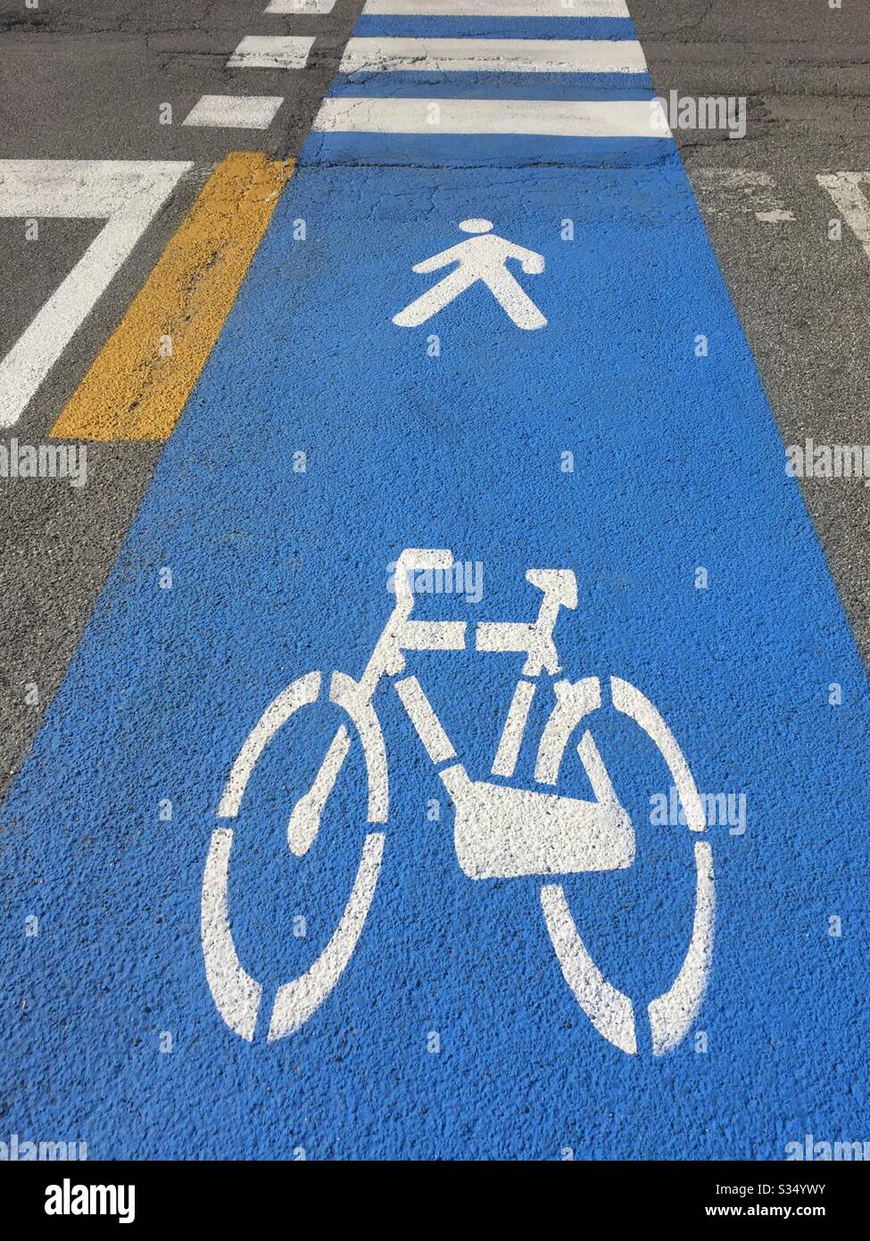 Italy, Lombardy, Bicycle Road Sign on Asphalt - Smartphone Captured Stock Image