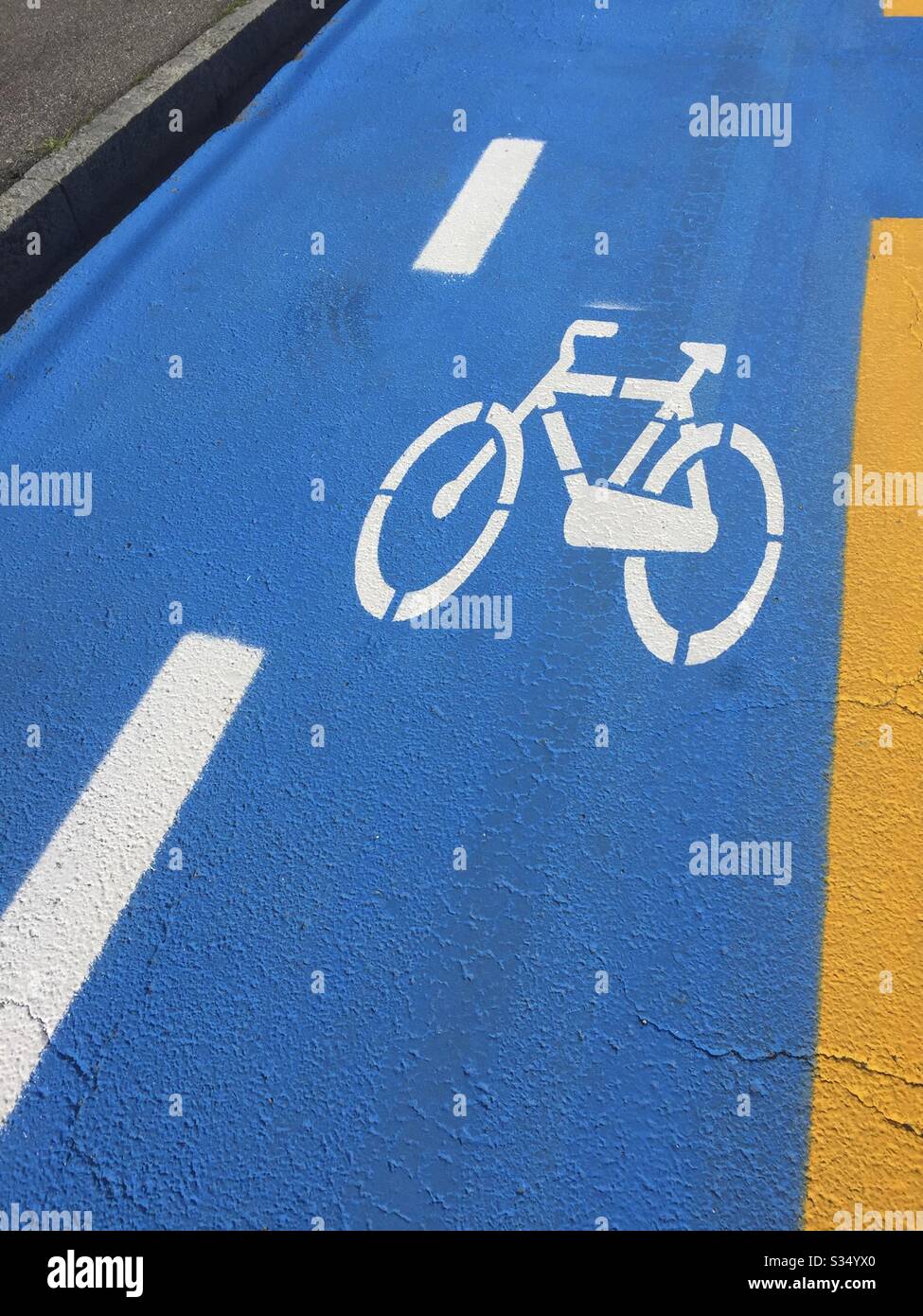 Italy, Lombardy, Bicycle Road Sign on Asphalt - Smartphone Captured Stock Image