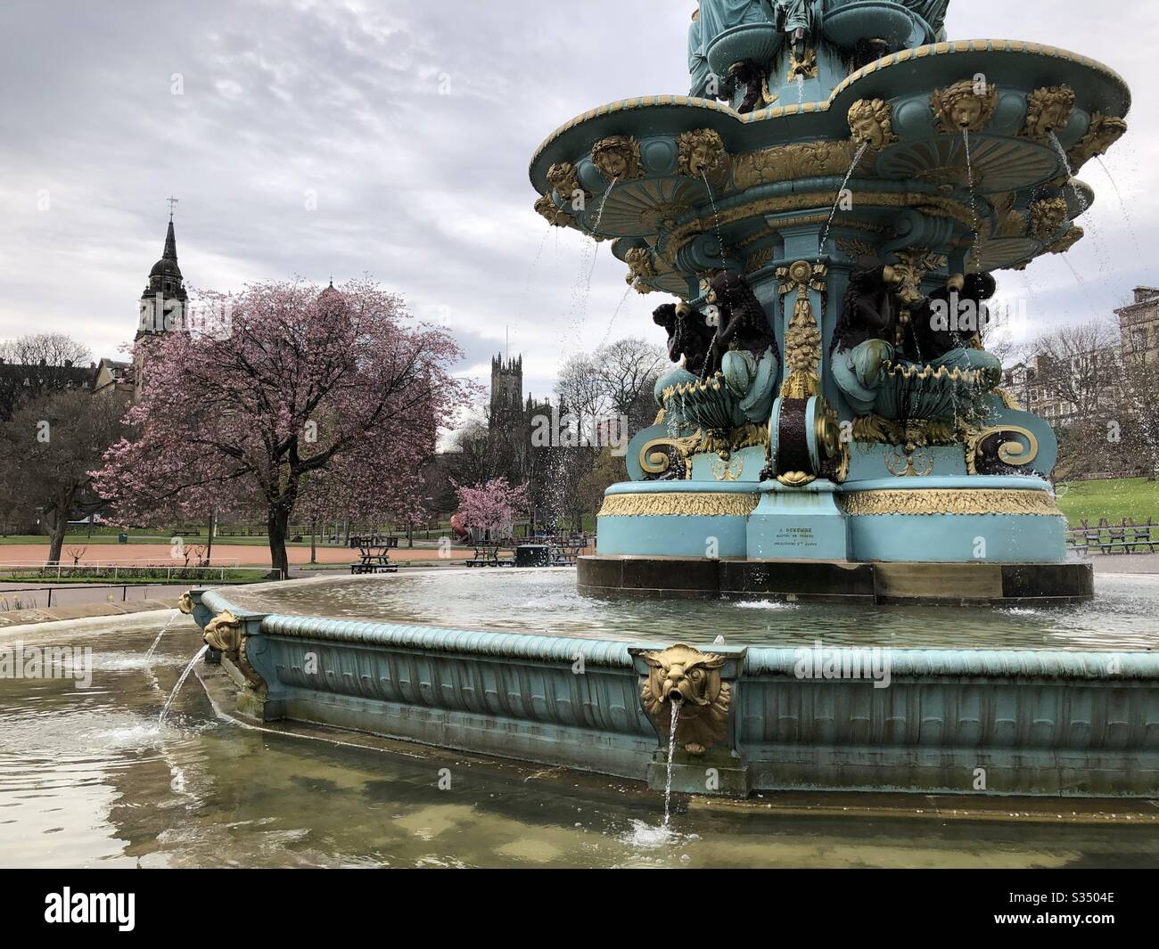 Ross Fountain and cherry blossom in West Princes Street Gardens, Edinburgh Stock Photo