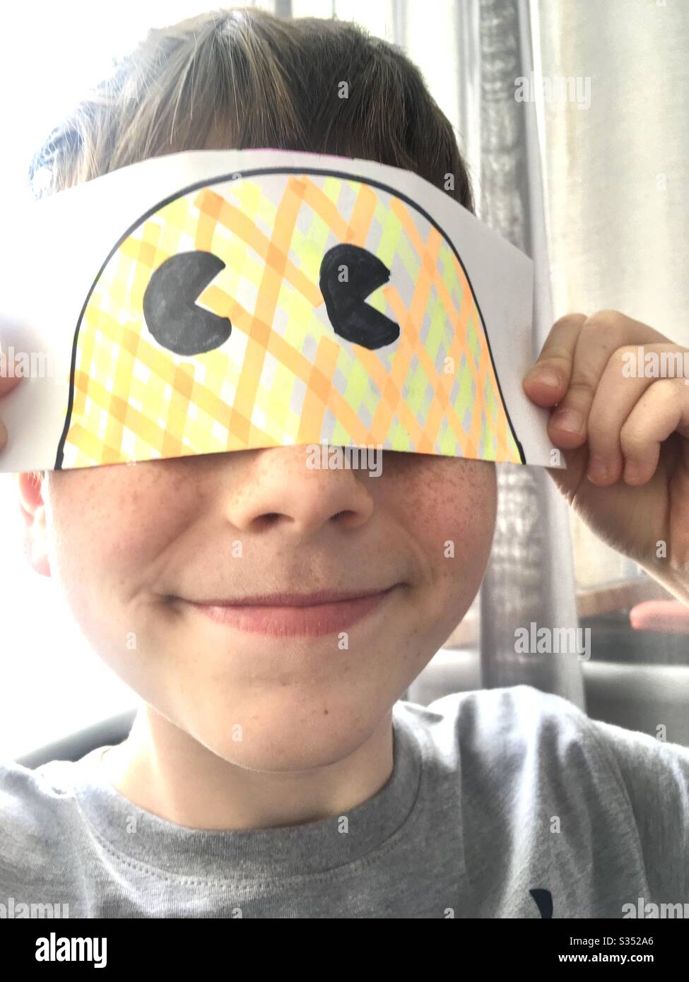 Boy with homemade mask on - Smartphone Captured Stock Image