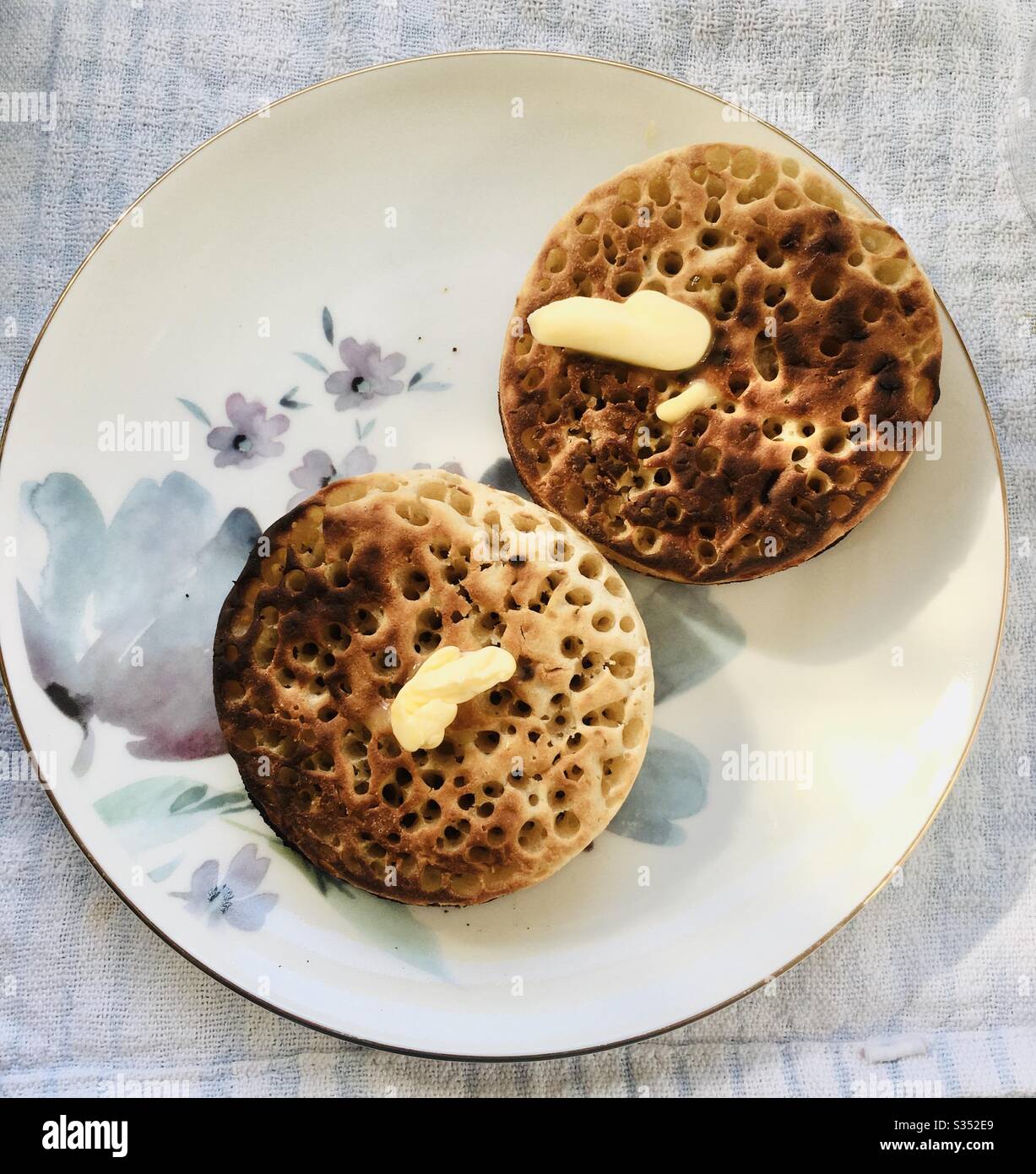 Crumpets with butter - Smartphone Captured Stock Image