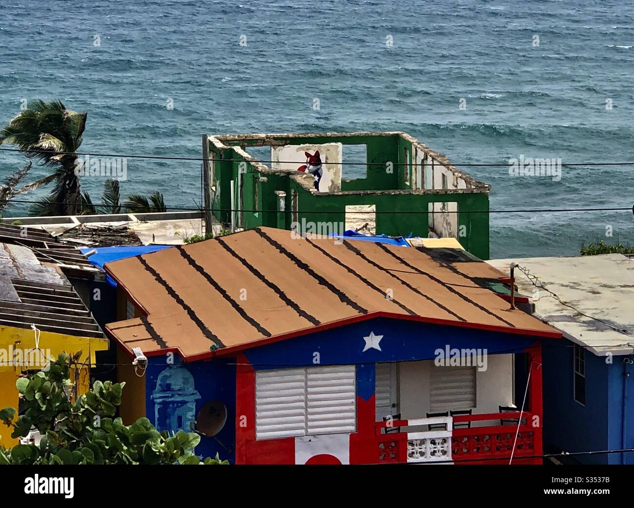 Hurricane María damaged houses in Puerto Rico Stock Photo