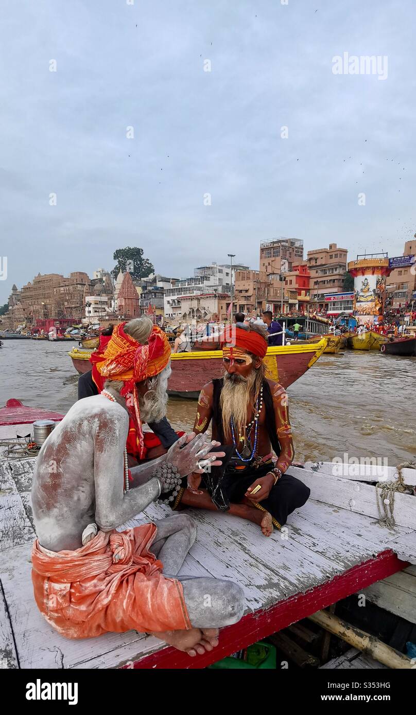 Hindu sadhus praying on the Ganges river in India. - Smartphone Captured Stock Image
