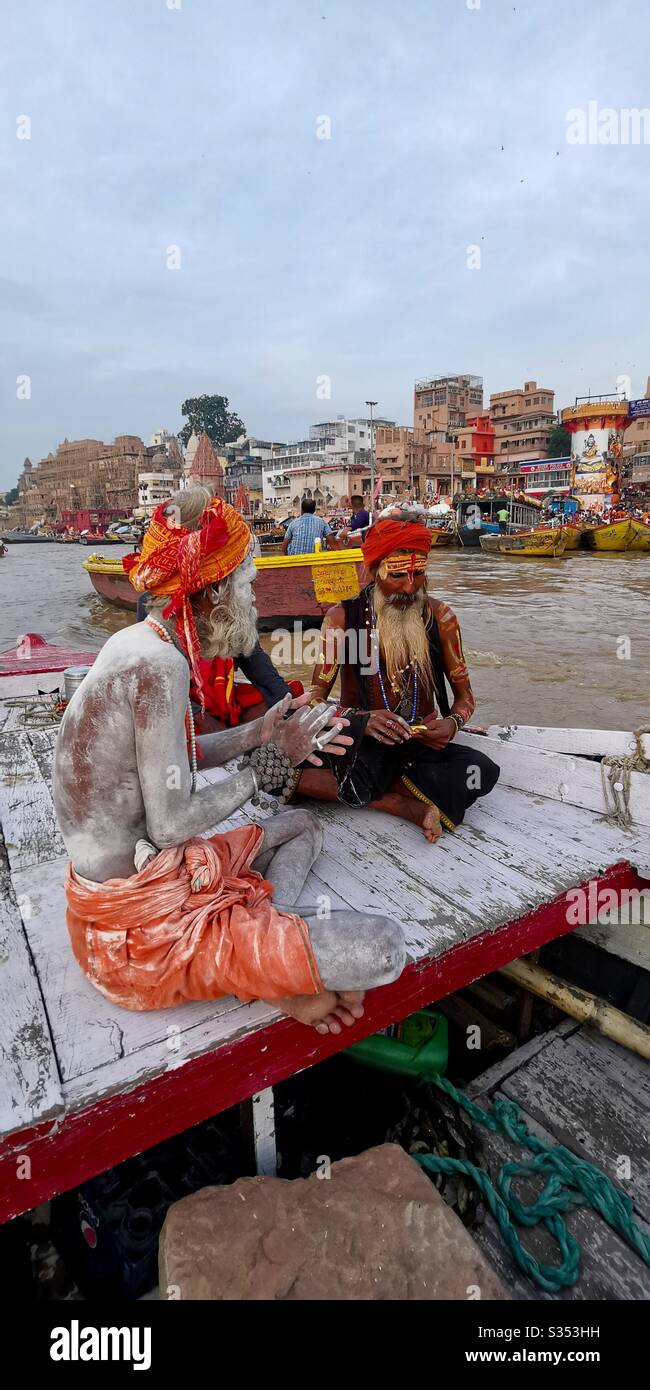 Hindu sadhus praying on the Ganges river in India. - Smartphone Captured Stock Image