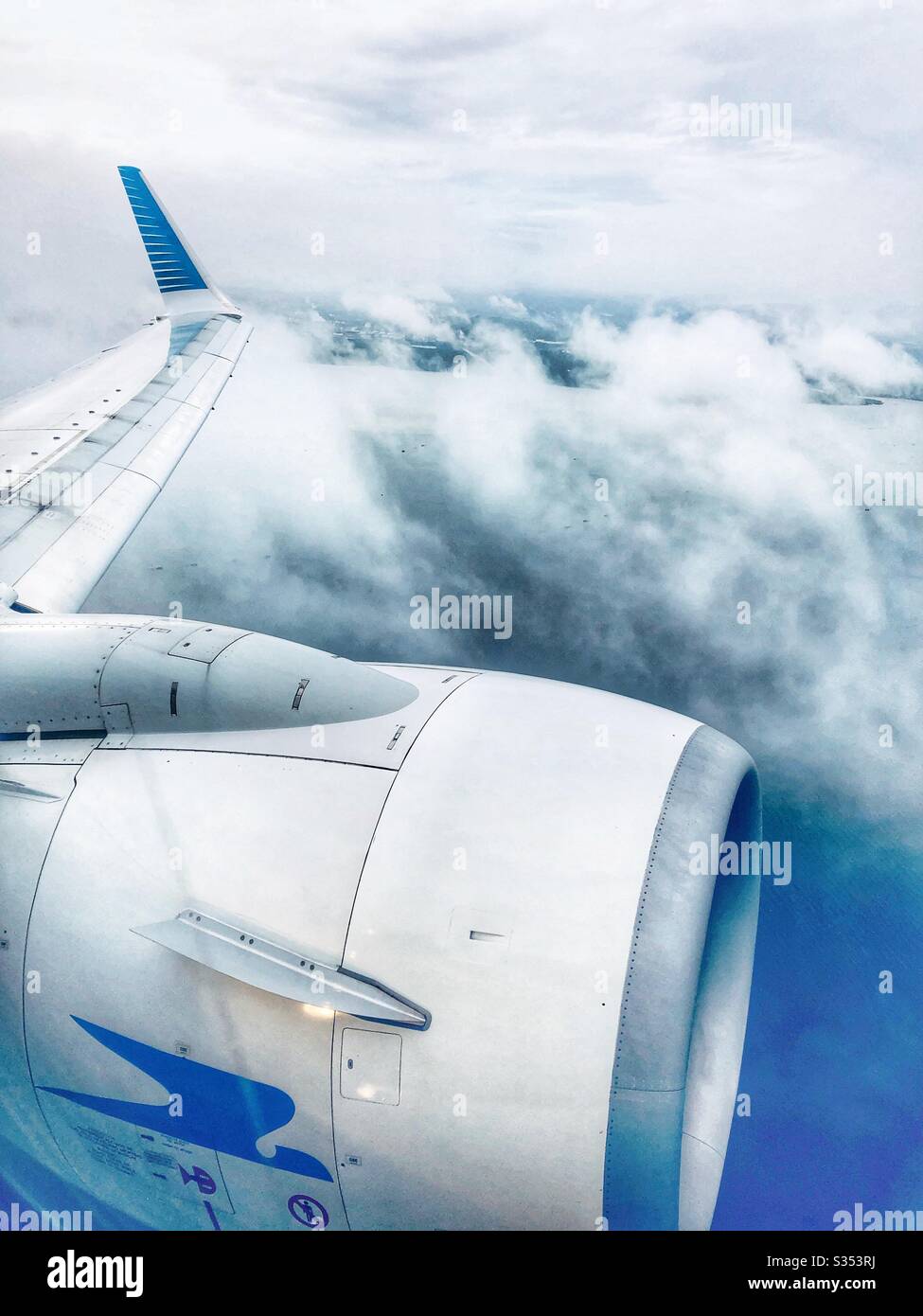 Flying into fluffy clouds. - Smartphone Captured Stock Image Flying into fluffy clouds. - Smartphone Captured Stock Image
