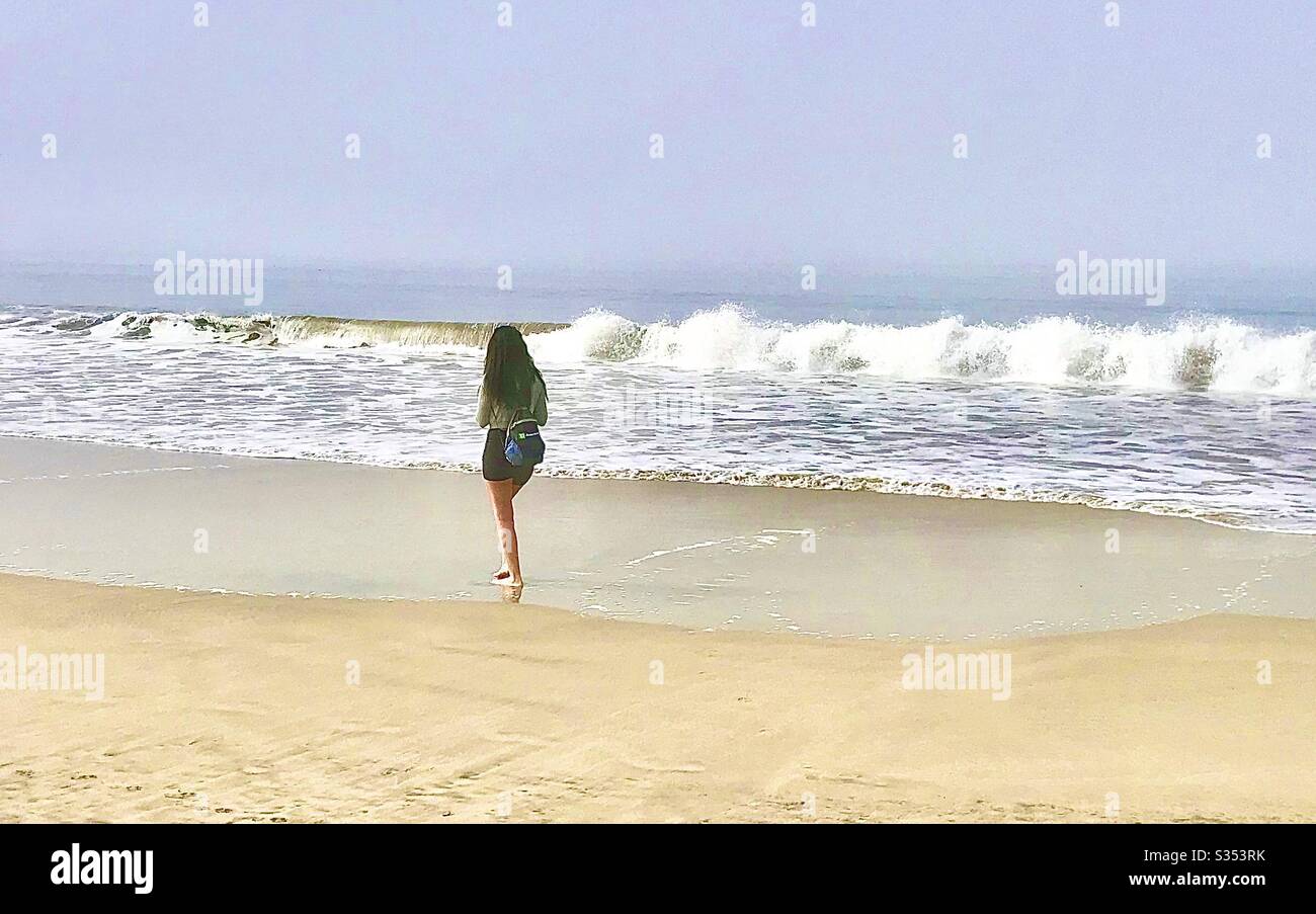 Woman and waves - Smartphone Captured Stock Image