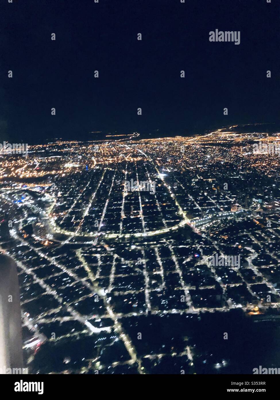 Aerial view of city lights flying over Brazil. - Smartphone Captured Stock Image