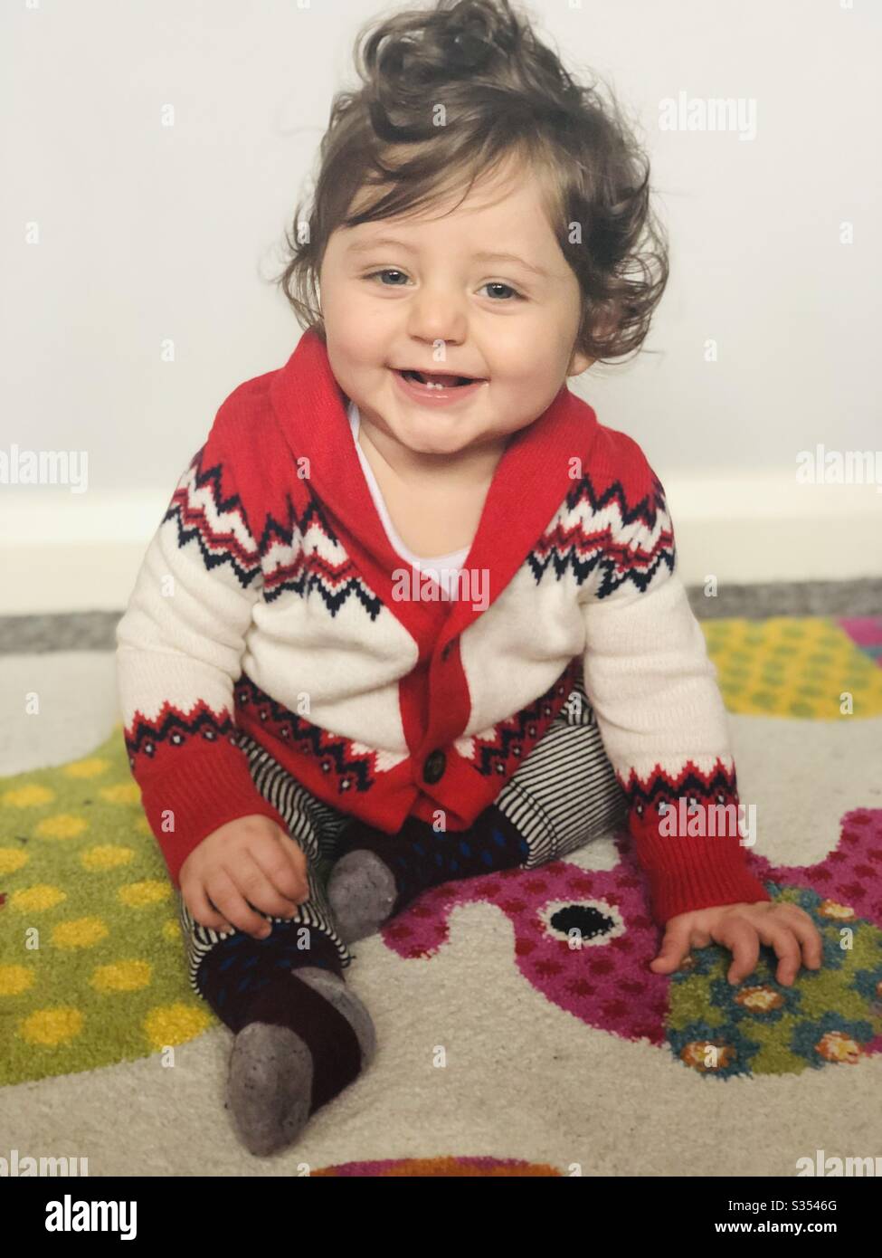 Baby boy sitting hi-res stock photography and images - Alamy