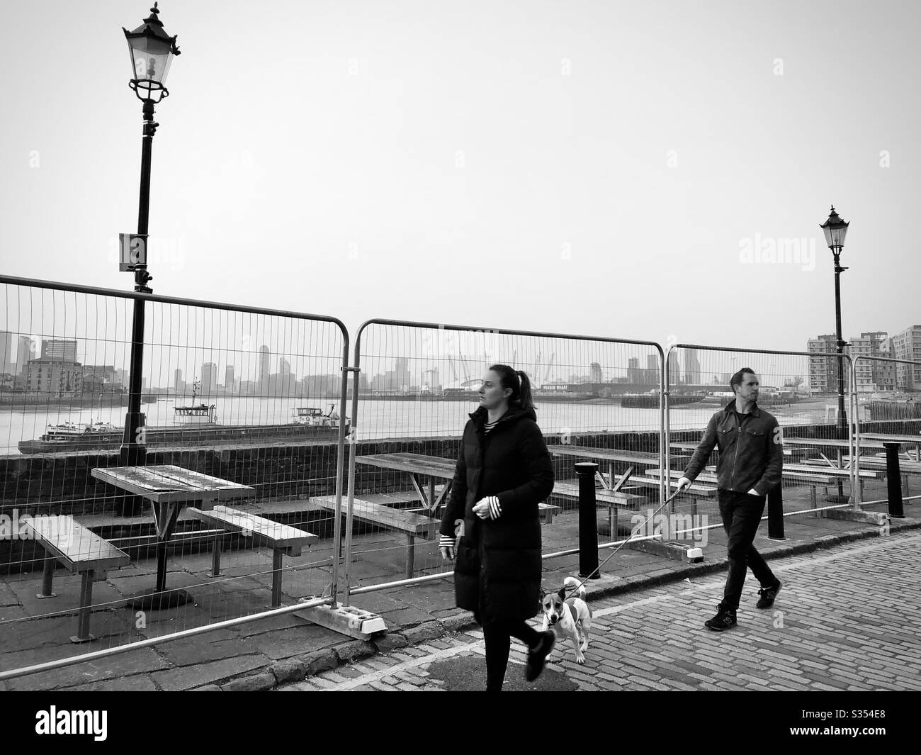 Fenced off pub tables in London during the coronavirus lockdown. - Smartphone Captured Stock Image