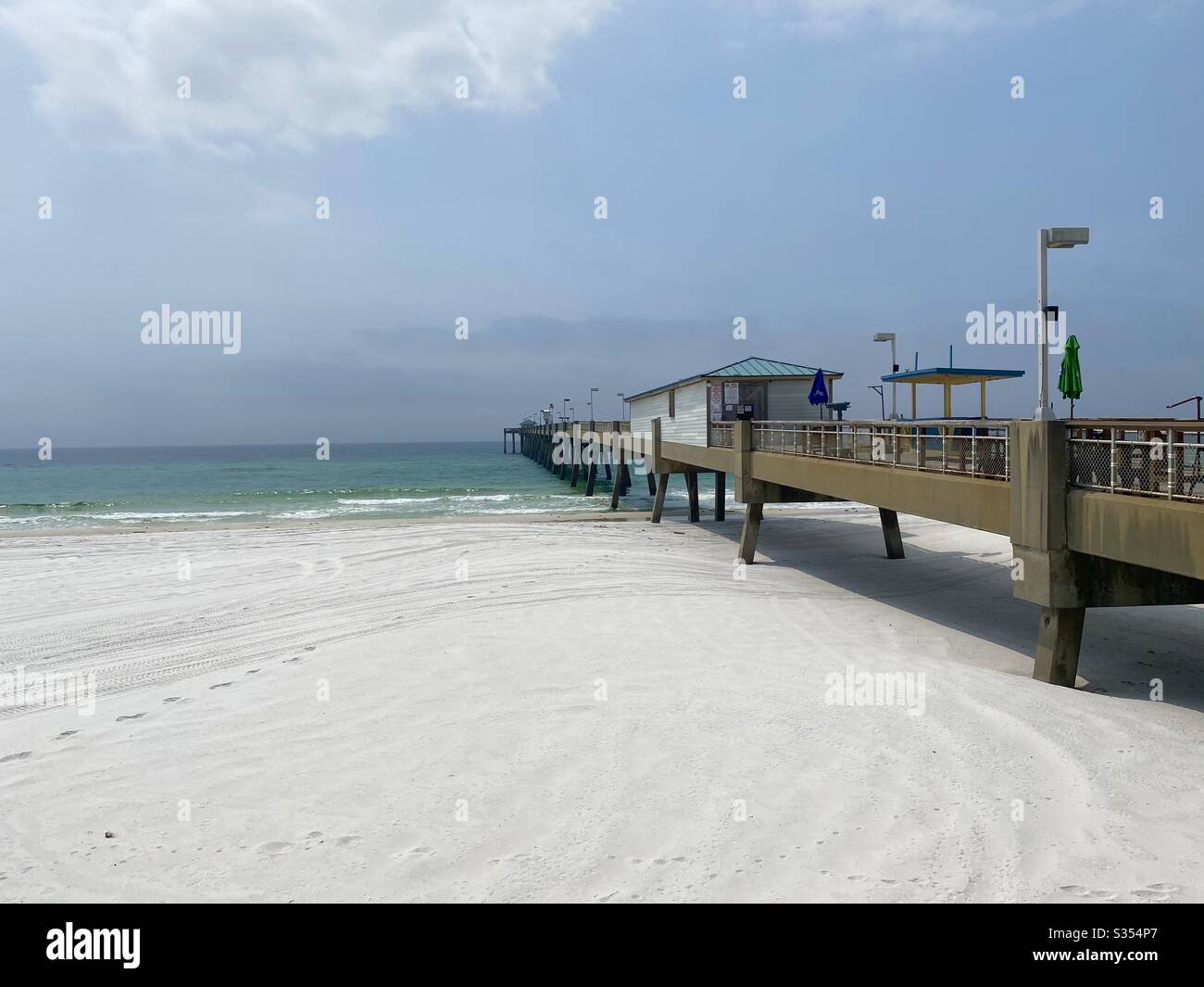Okaloosa Island public fishing pier over the Gulf of Mexico water - Smartphone Captured Stock Image