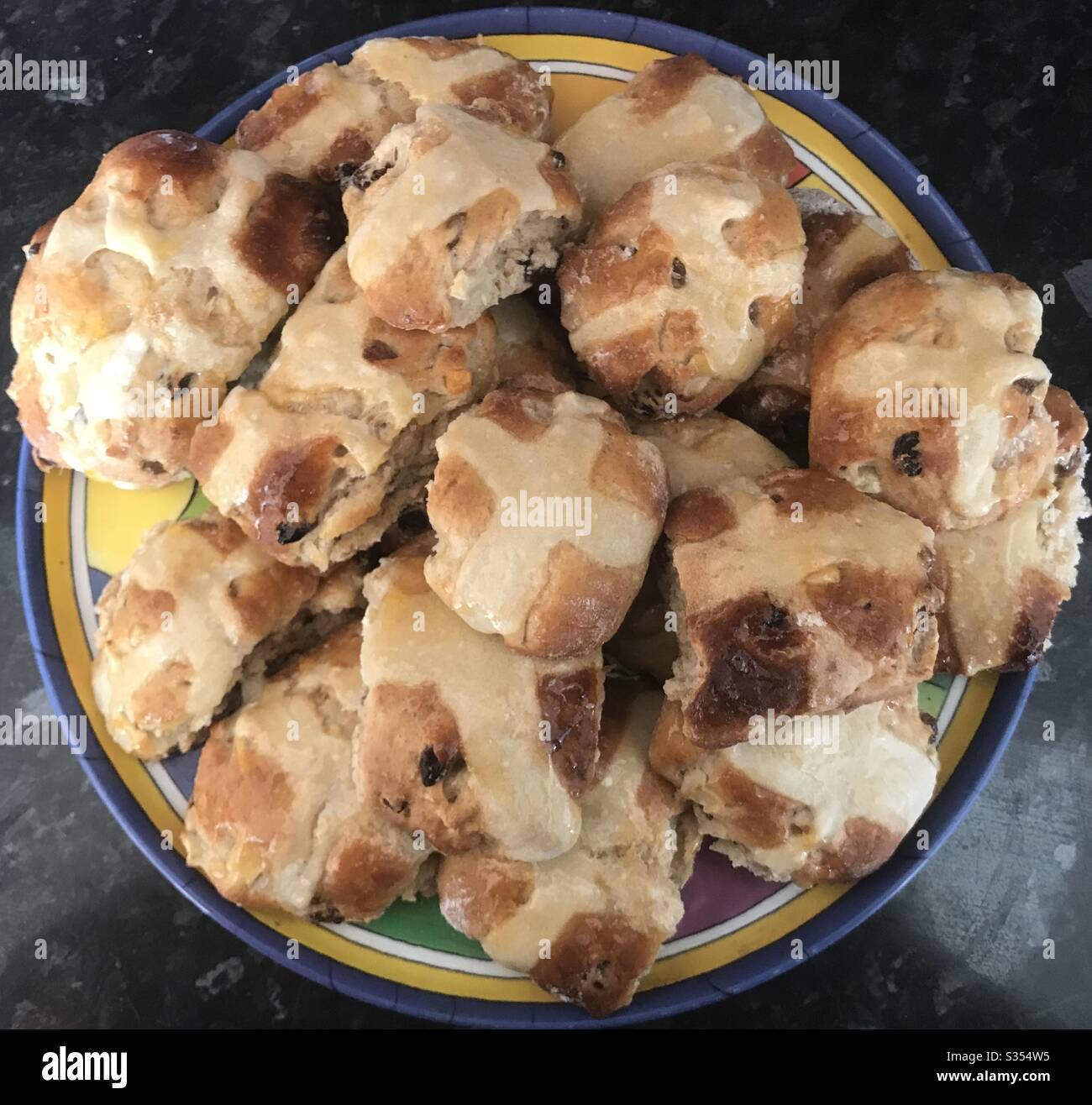 Hot cross buns of all shapes and sizes. - Smartphone Captured Stock Image