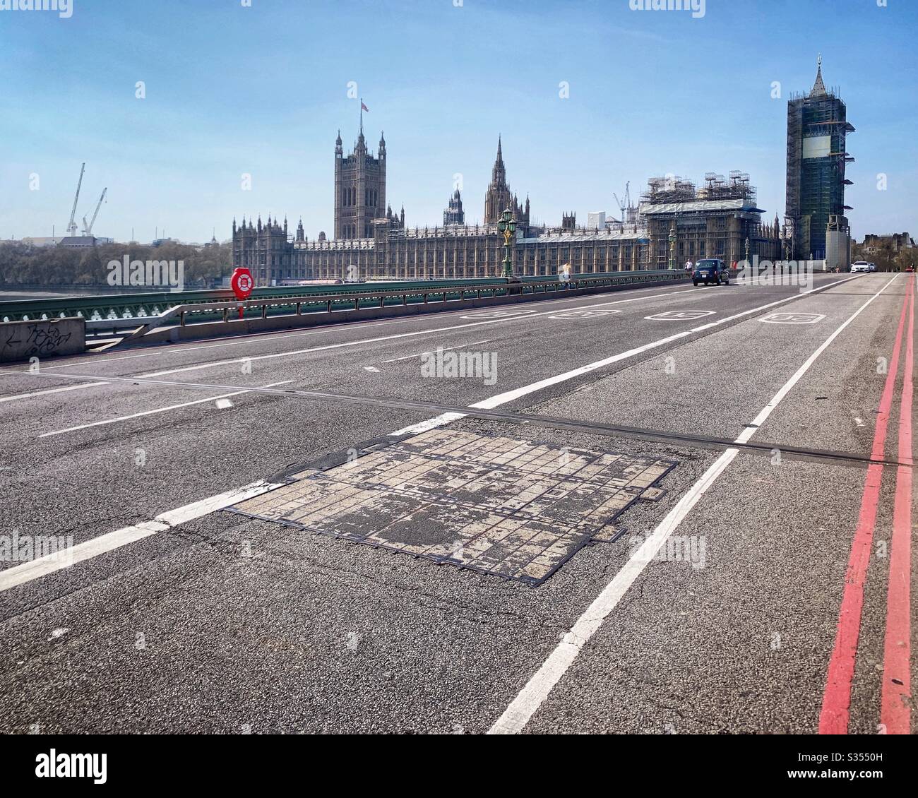 Westminster Bridge during lockdown due to covid 19 pandemic. Easter bank holiday weekend. London, UK - Smartphone Captured Stock Image