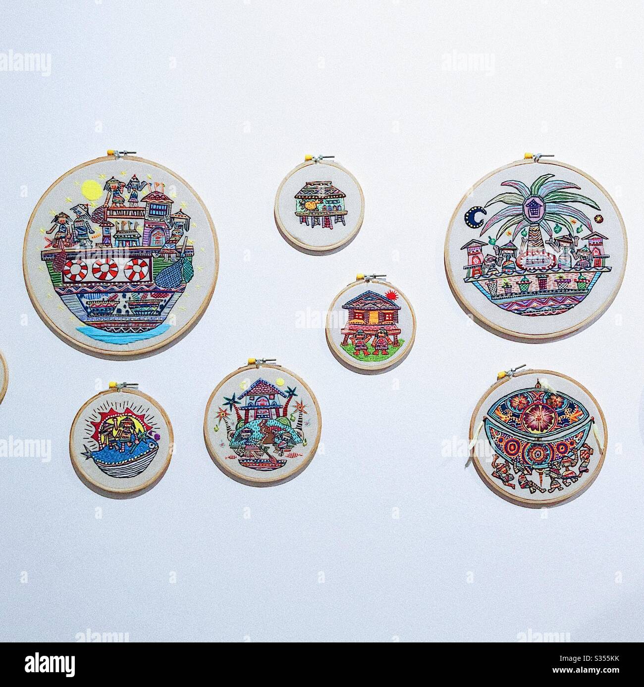 Sewing embroidery with wau bulan and boats Stock Photo - Alamy