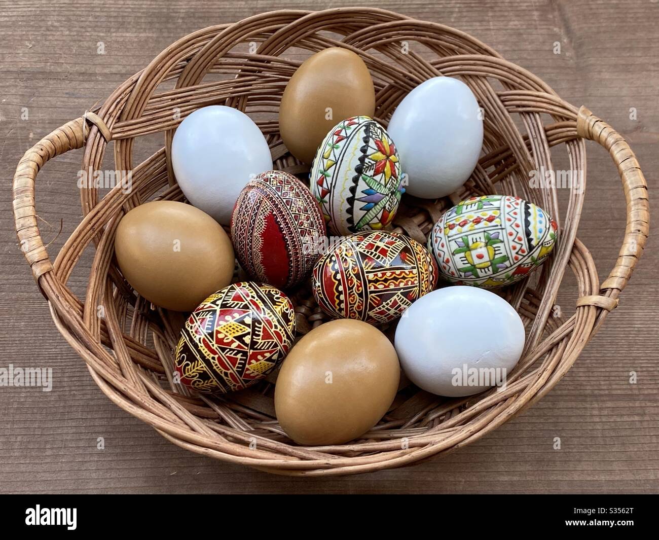 Decorated Easter eggs in a wicker basket - Smartphone Captured Stock Image
