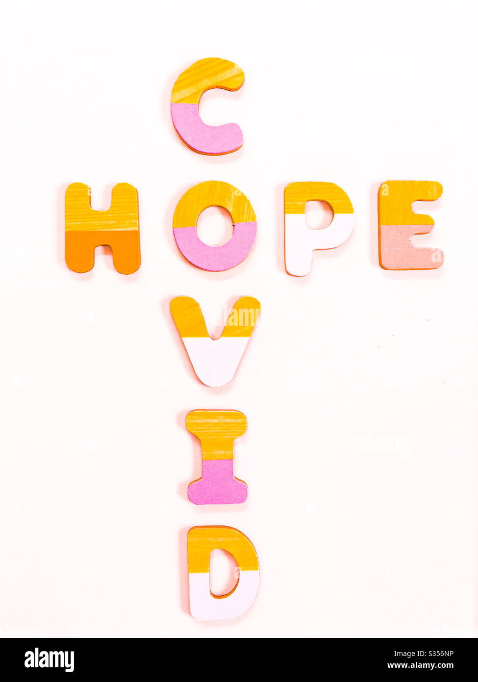 “Covid19, hope”, stencil lettering on white background Stock Photo