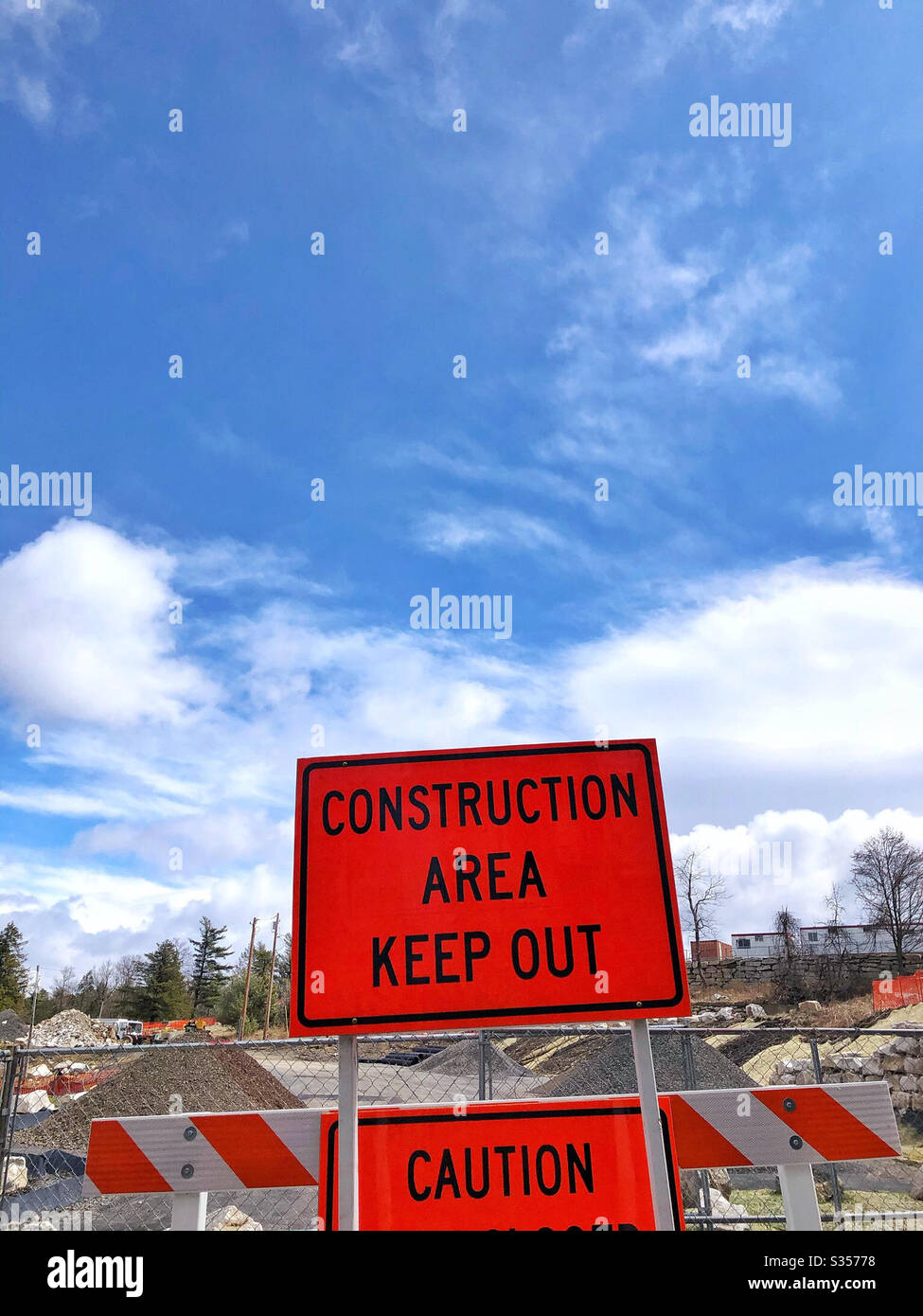 Sign at construction area stating keep out and caution to restrict access - Smartphone Captured Stock Image