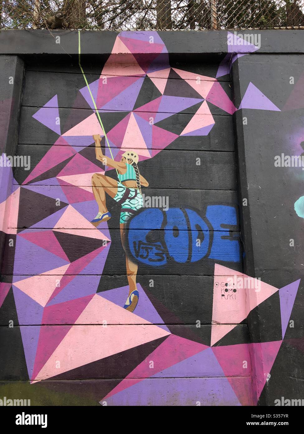 A colourful sports-themed graffiti mural in a Toronto neighbourhood. - Smartphone Captured Stock Image