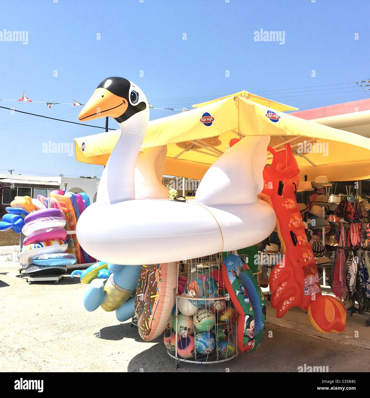 Giant inflatables at shop in Greece Stock Photo