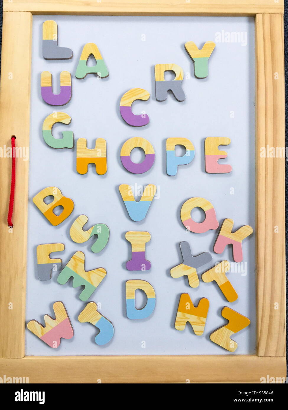Words using Art alphabet stencils, COVID, hope, laugh, cry Stock Photo