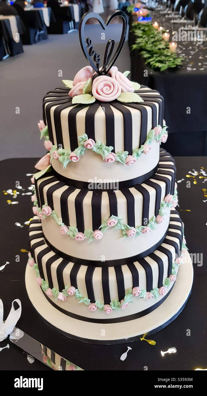 Wedding time with a beautiful 3 tiered cake Stock Photo