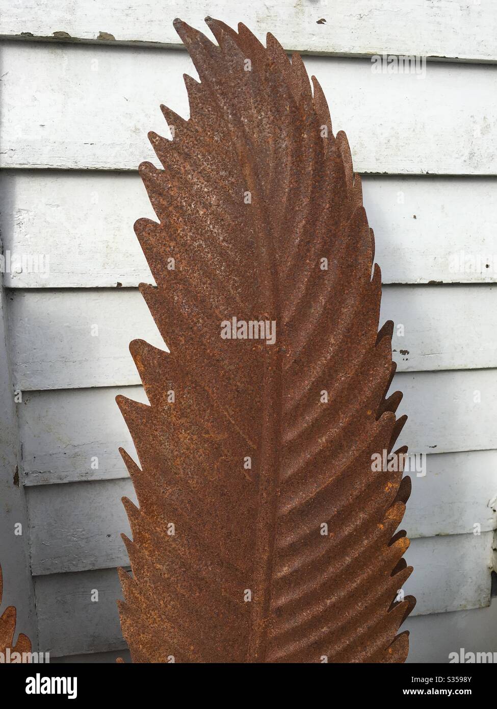 Metal fern/leaf decorative garden art Stock Photo Alamy