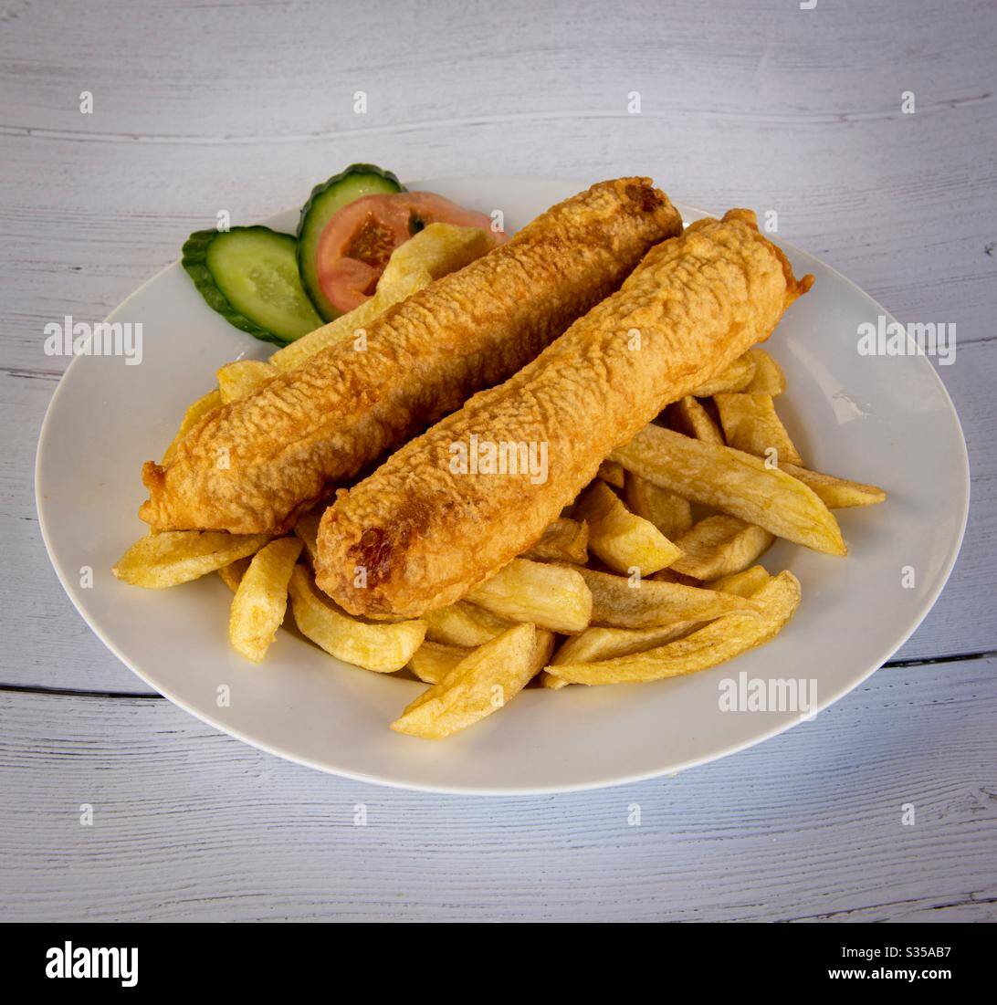 Two fried sausages in batter with french fried potatoes - Smartphone Captured Stock Image