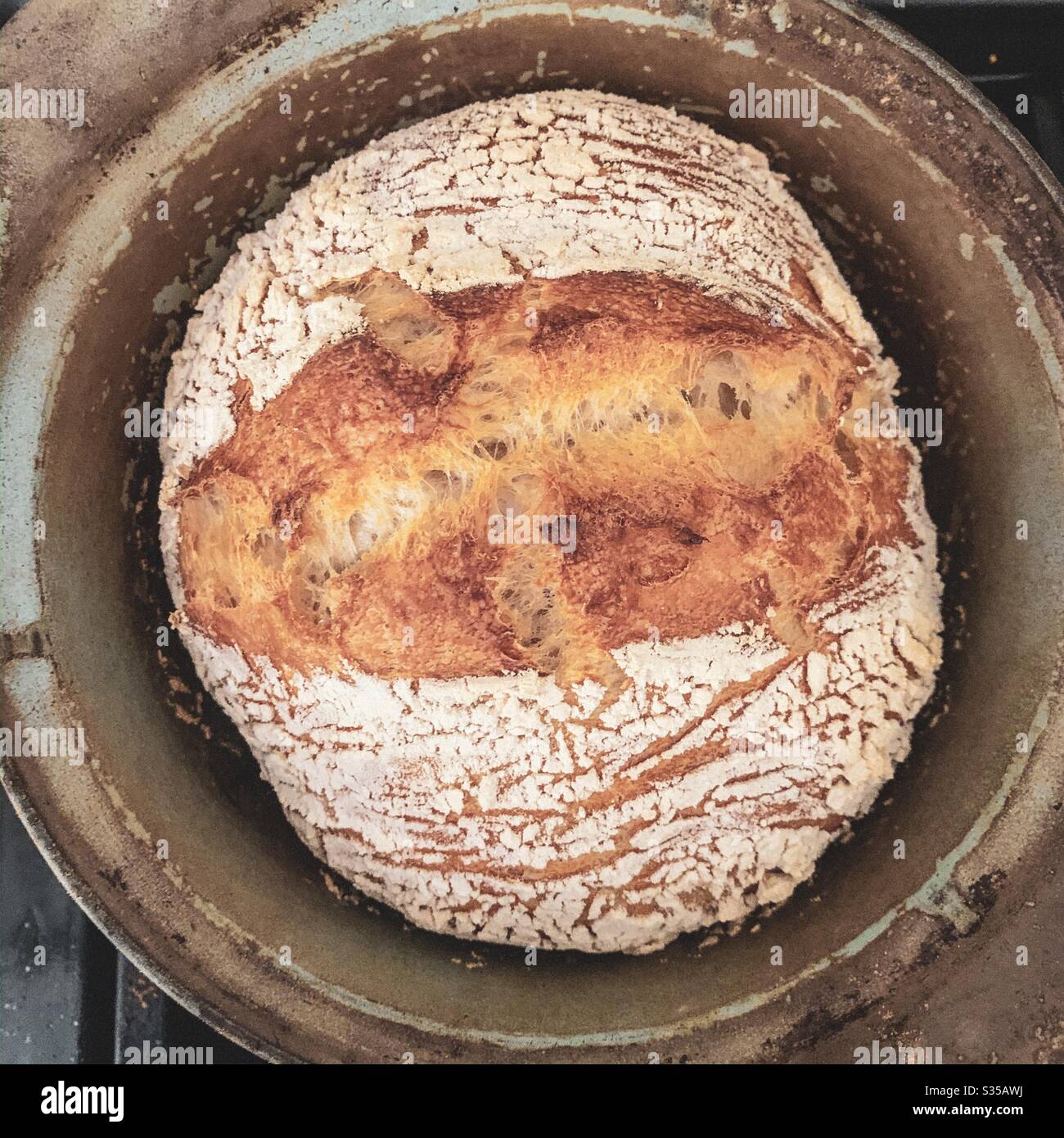 Homemade sourdough bread in vintage cast iron pot Stock Photo Alamy