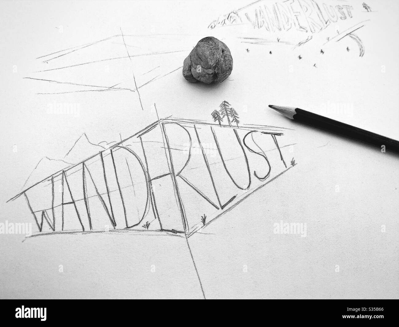 Close up view of my sketchbook. Practicing hand lettering and typography during a graphic design study session. Sketching and drawing. Wanderlust concept. Rough sketch on paper with pencil and eraser - Smartphone Captured Stock Image