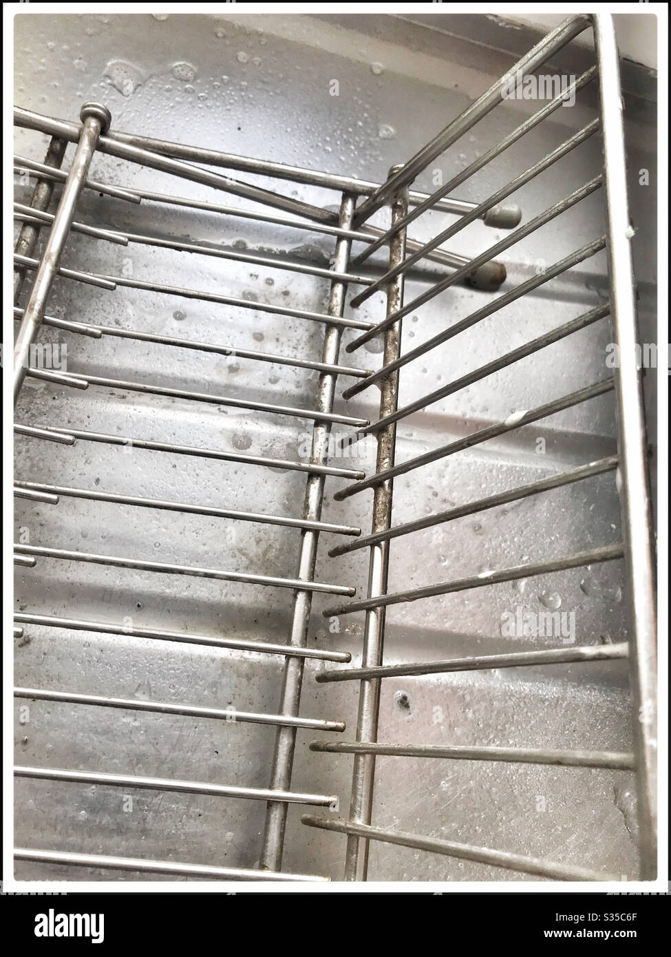 Deep cleaning kitchen during coronavirus lockdown. - Smartphone Captured Stock Image