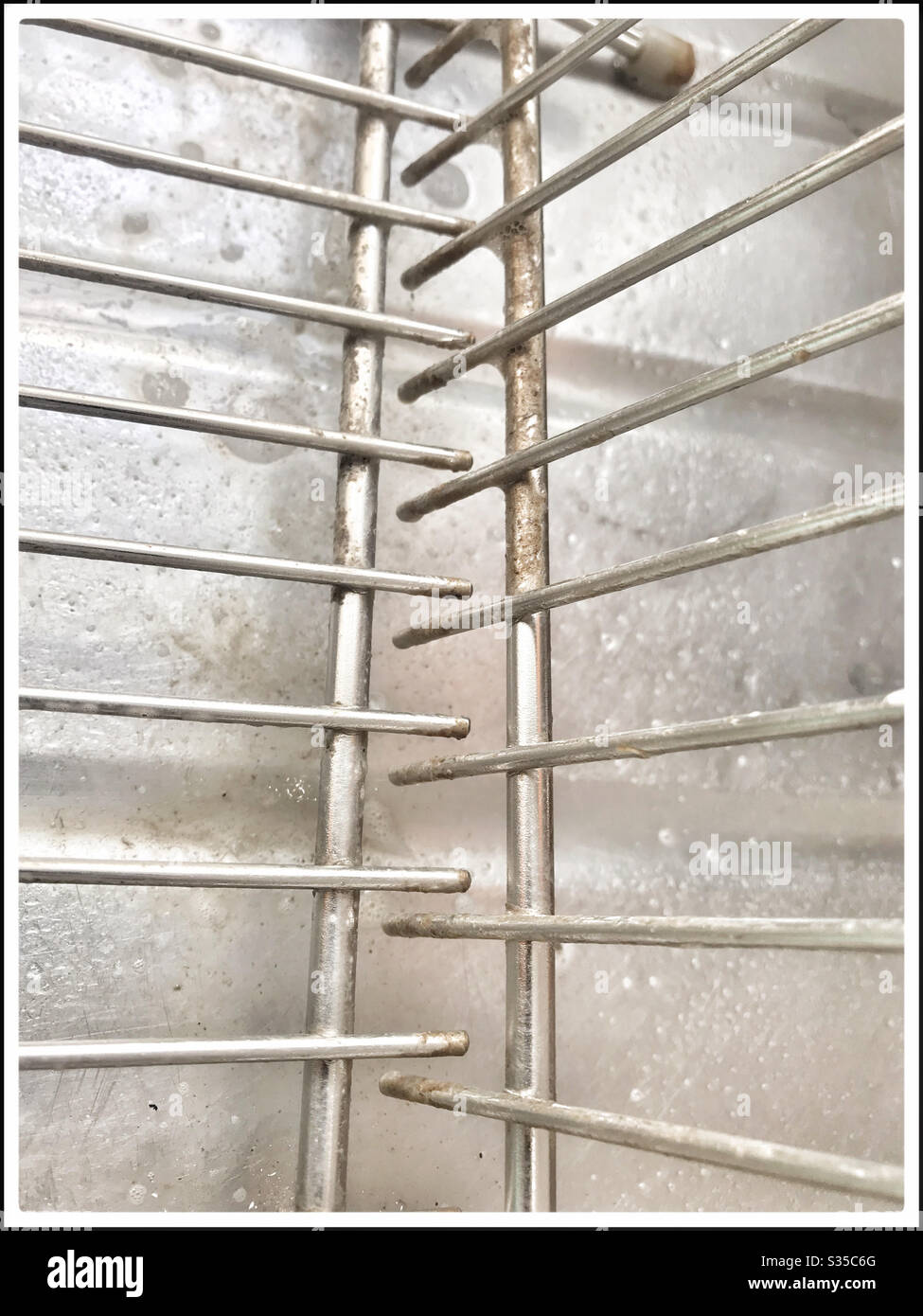 Deep cleaning kitchen during coronavirus lockdown. - Smartphone Captured Stock Image