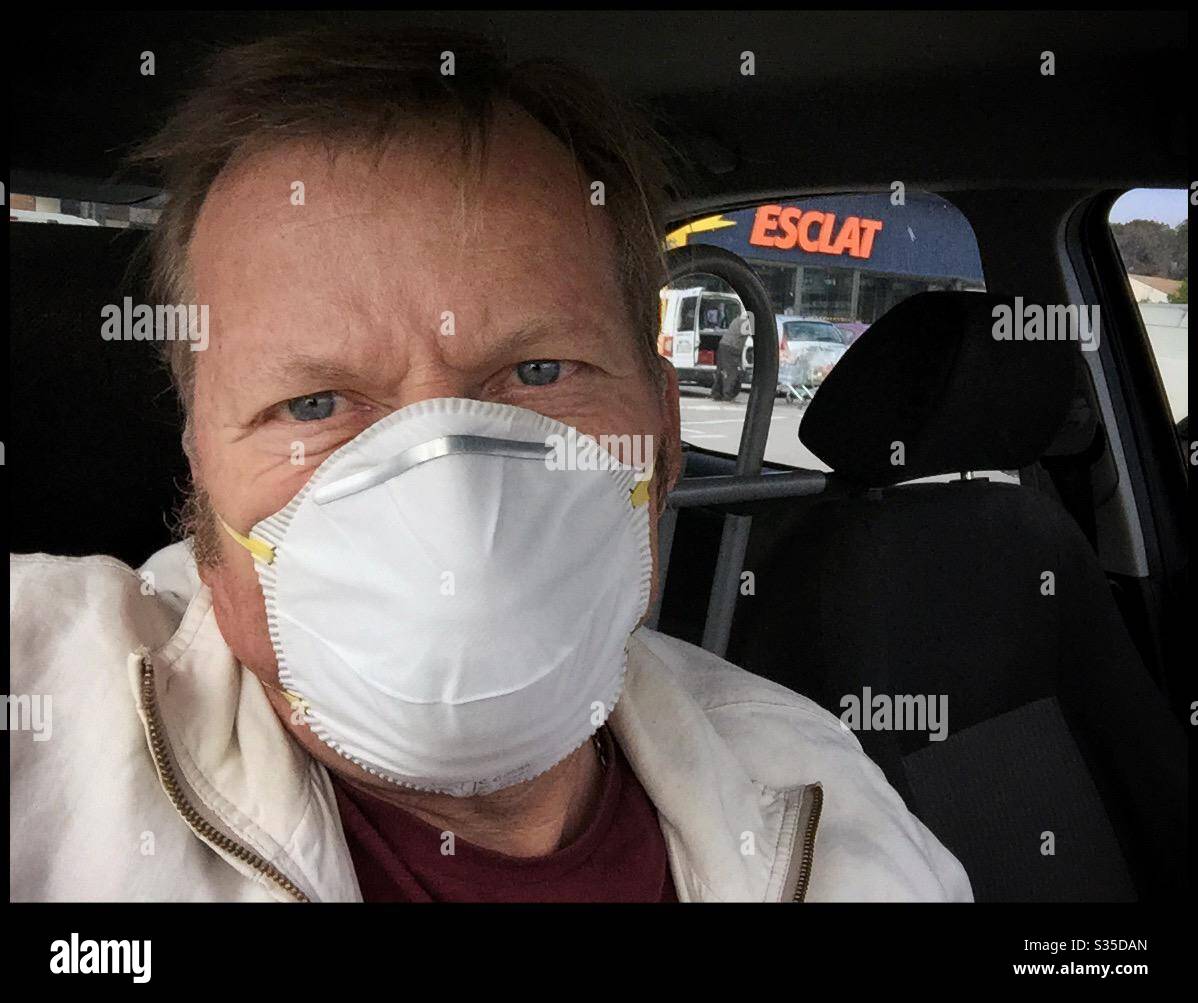 Going to the Esclat supermarket during COVID-19 lockdown, Catalonia, Spain. - Smartphone Captured Stock Image