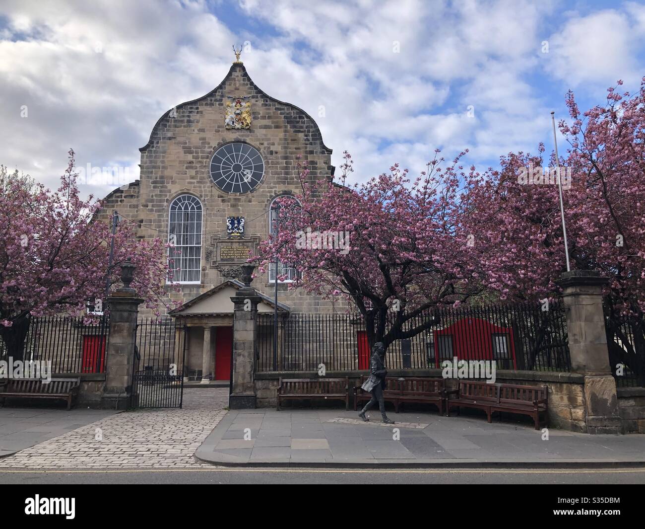 Spring cherry blossom outside Canongate Kirk church, on the Royal Mile, Edinburgh, April 2020 Stock Photo