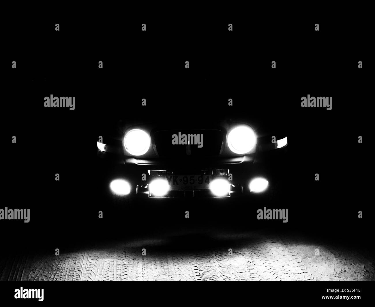 Car lights in the night Stock Photo Alamy