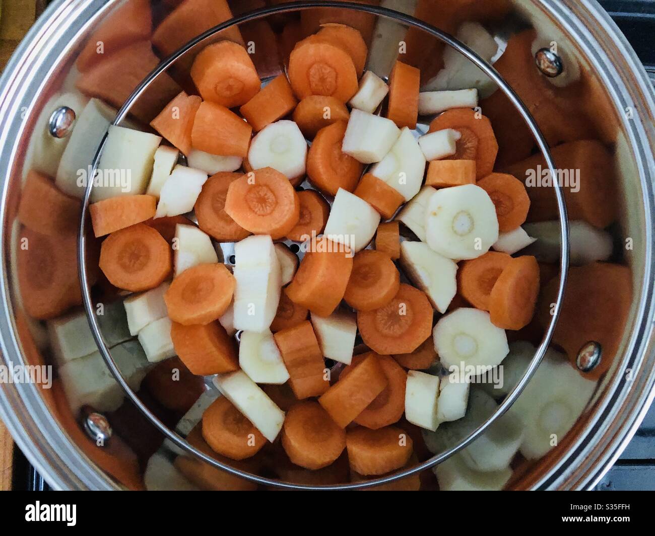 Vegetables in a Steamer Pot Stock Photo Alamy