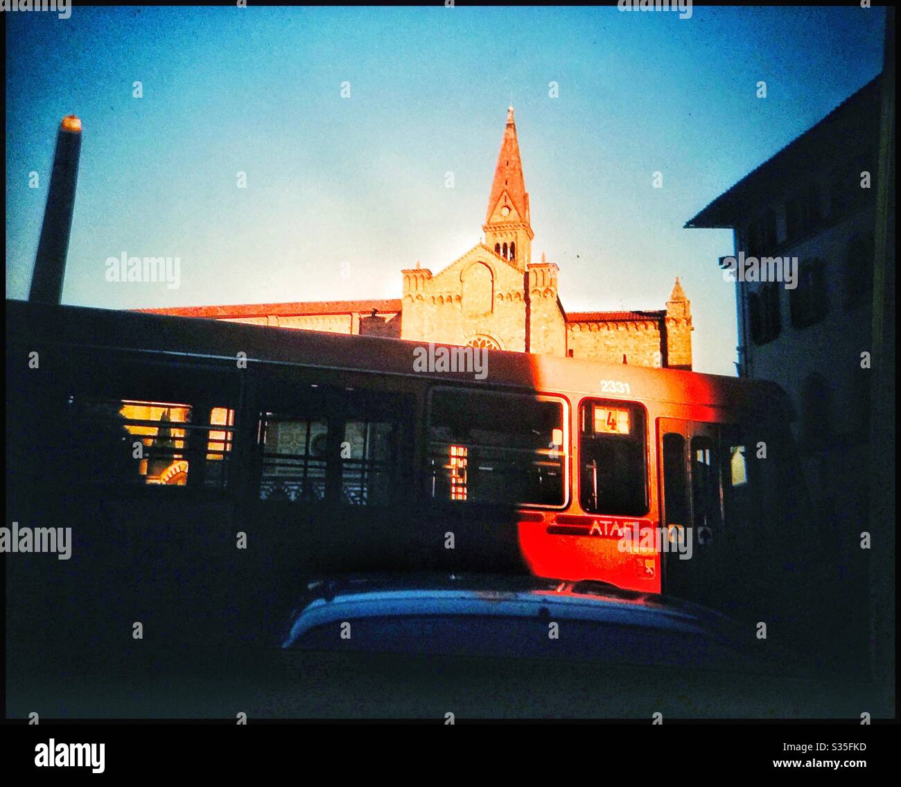 Morning sun catches a bus in Florence , Italy. - Smartphone Captured Stock Image