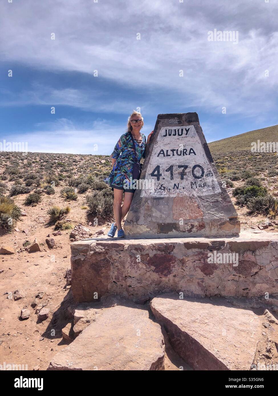 A stone marker indicating the highest point above sea level in the mountains of Northern Argentina. - Smartphone Captured Stock Image