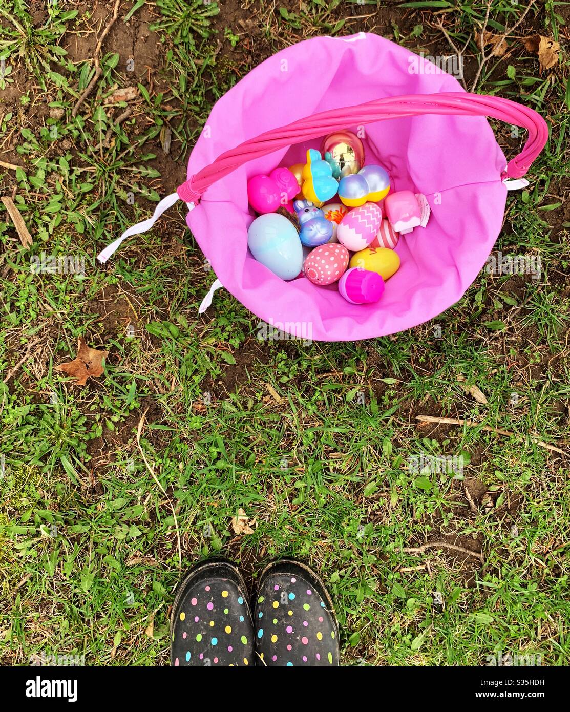 Easter basket outside in green grass - Smartphone Captured Stock Image