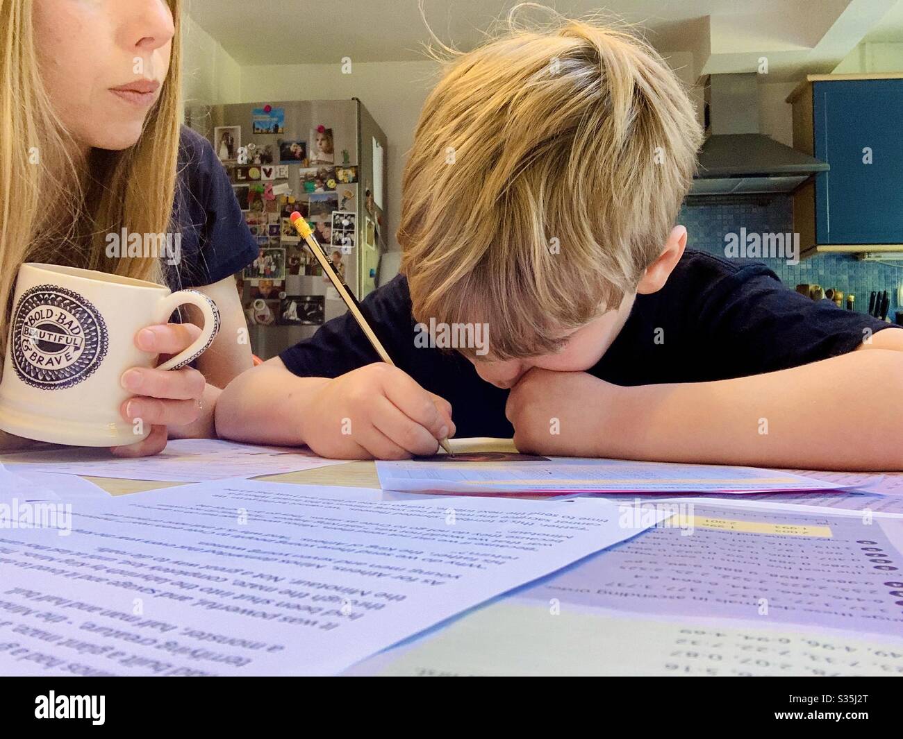 Home Schooling during the Coronavirus Pandemic, April 2020 Stock Photo