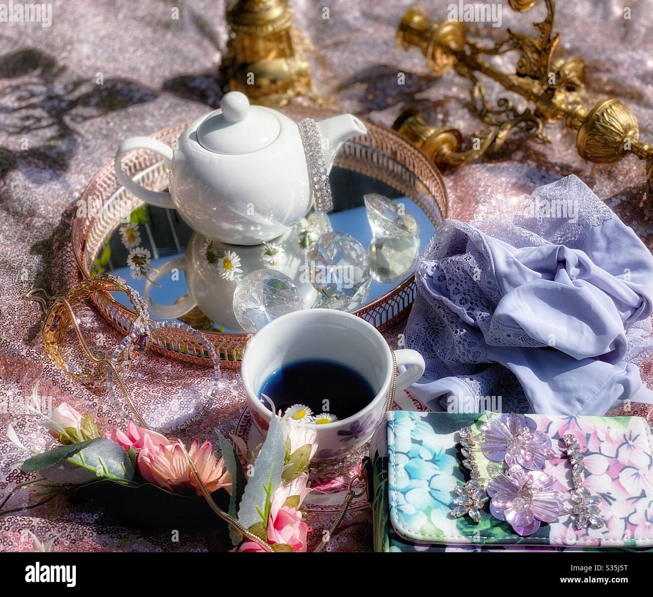 Alice in wonderland tea party blue tea Stock Photo - Alamy
