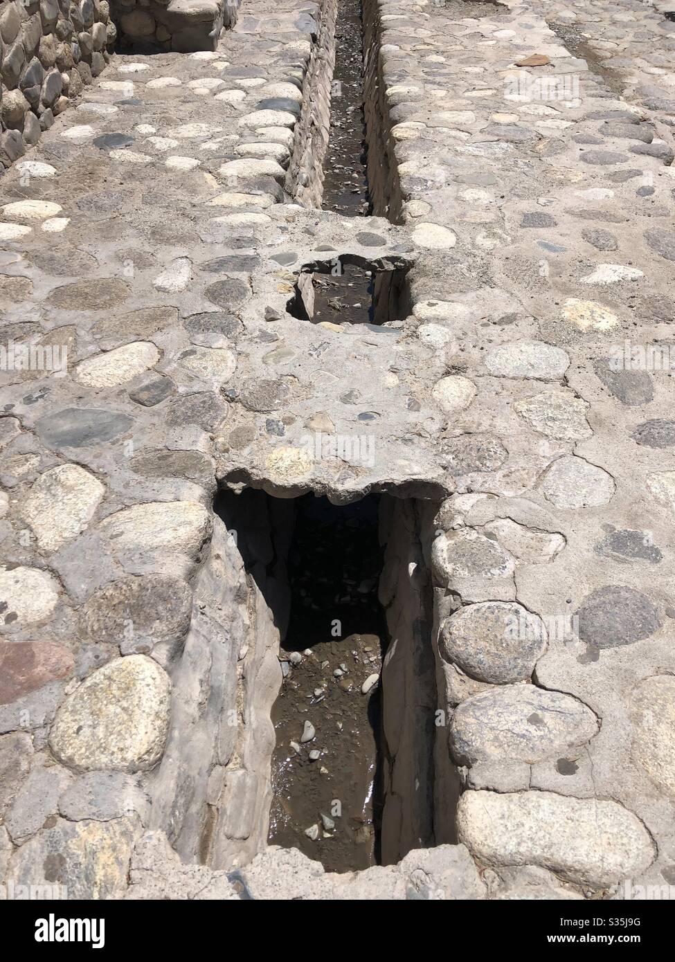Aqua ducts in Cachi, Argentina. - Smartphone Captured Stock Image