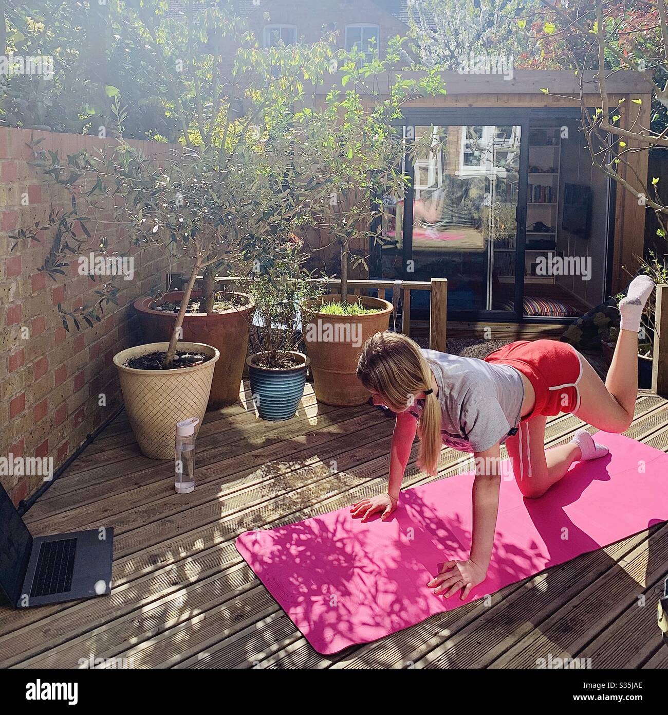 HIIT workout via Zoom - Smartphone Captured Stock Image