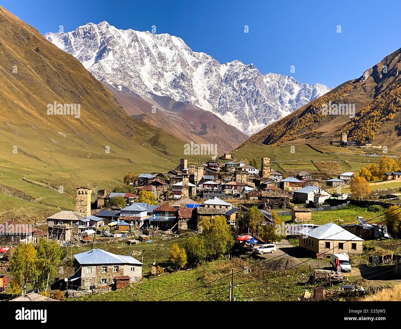The UNESCO mountain village of Ushguli in Georgia. A medieval village of Svaneti towers in a mountain valley in the Caucasus mountains. - Smartphone Captured Stock Image