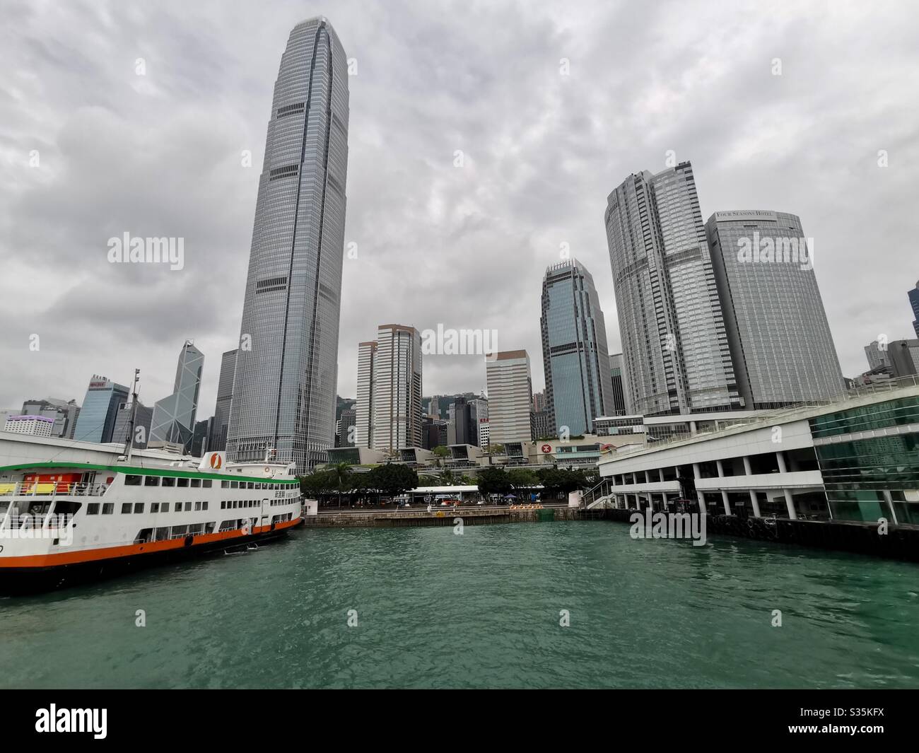 IFC tower and the central piers in Hong Kong. - Smartphone Captured Stock Image