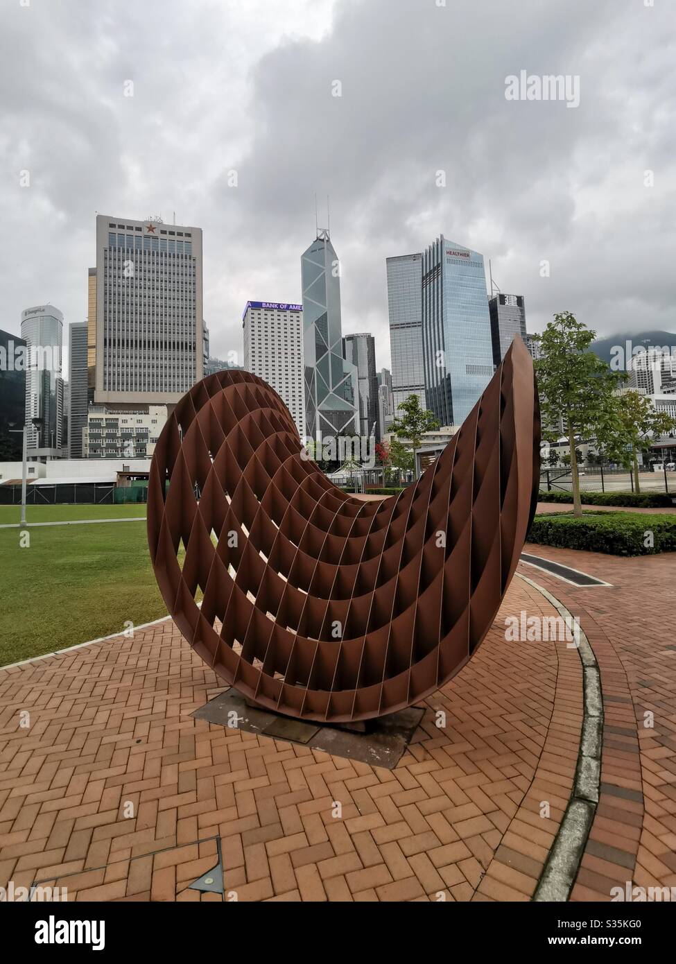 Tamar park by the Victoria harbour waterfront in Hong Kong. - Smartphone Captured Stock Image