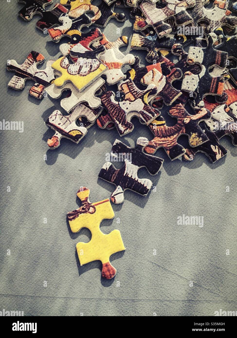 Still life of jigsaw puzzle pieces in a pile - Smartphone Captured Stock Image