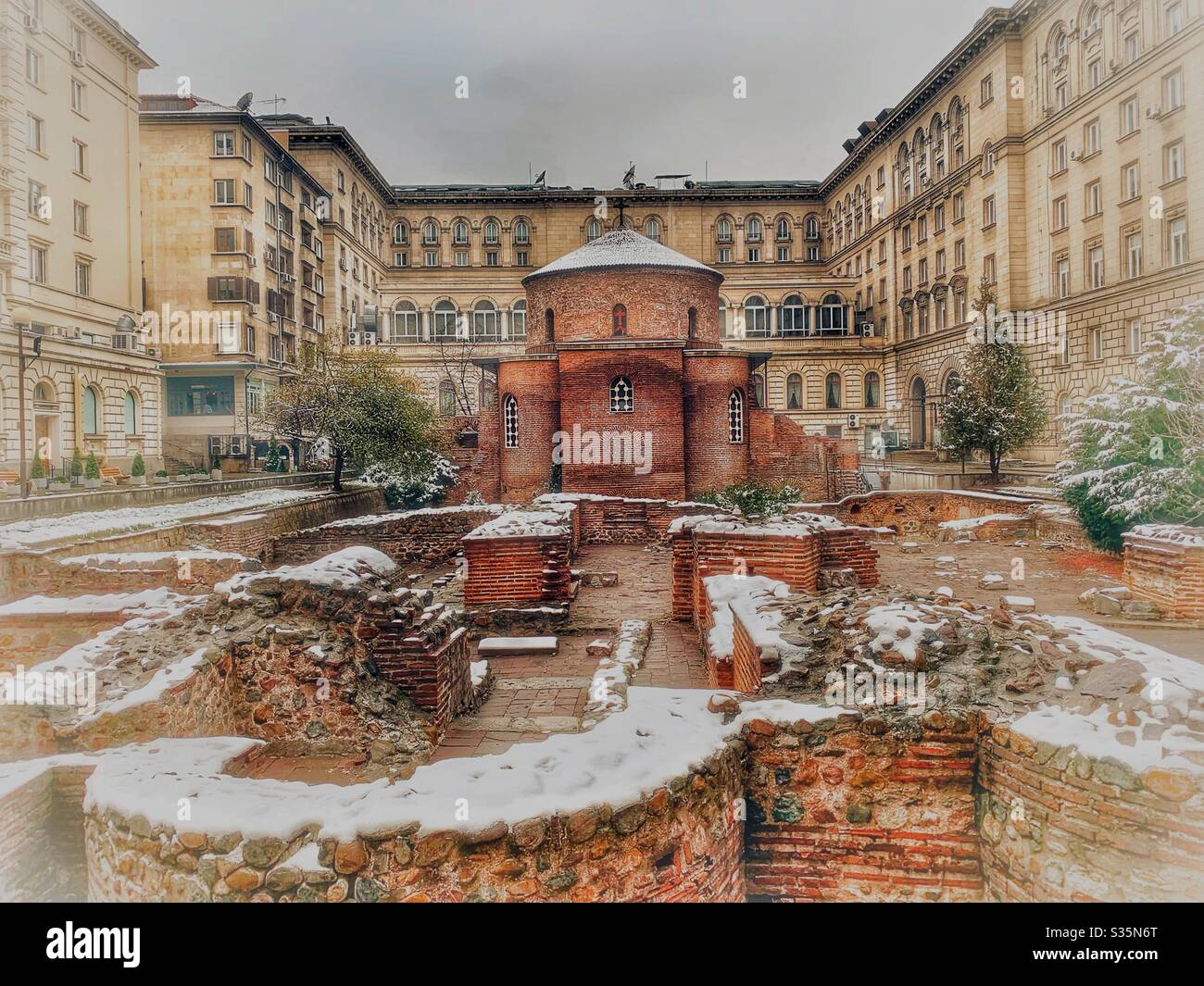 St George Rotunda Church in the snow. Situated in the courtyard of a beautiful building. Sofia, Bulgaria. - Smartphone Captured Stock Image