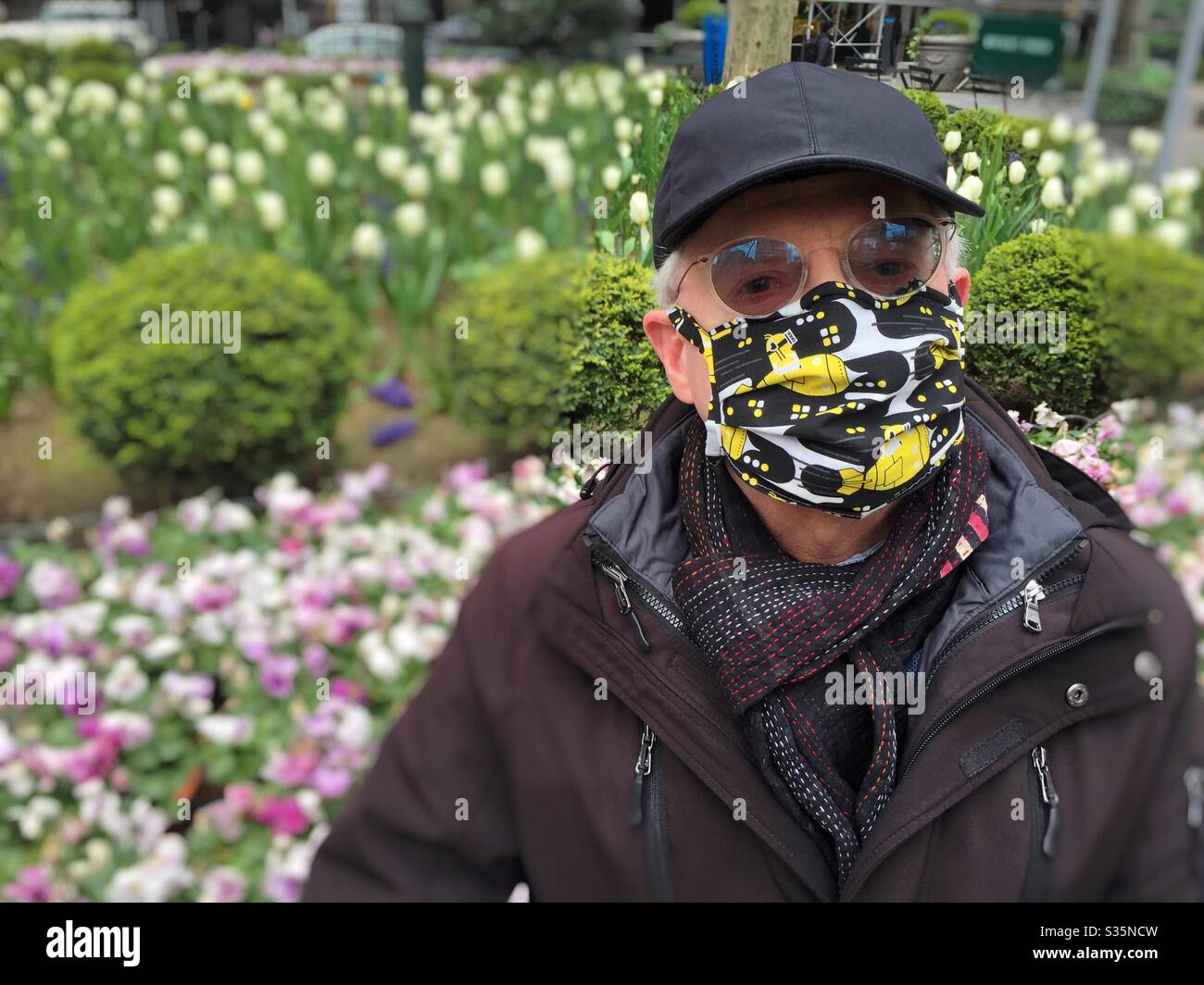 New Yorkers have been asked to wear facemasks during the COVID-19 sanctions when they are outside or unable to social distance, NYC, 2020, USA - Smartphone Captured Stock Image