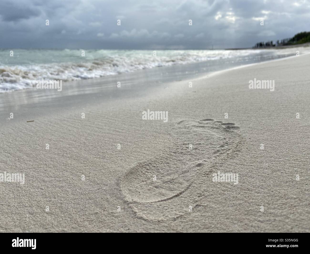 Footprint in the Sand Stock Photo