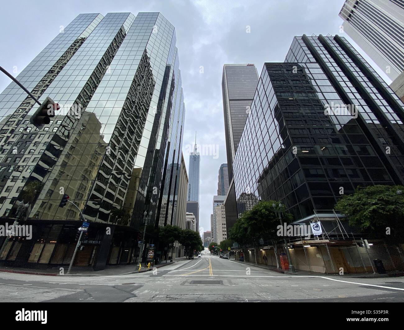 LOS ANGELES, CA, APR 2020: deserted Wilshire Blvd in Downtown during coronavirus, Covid-19 lockdown and stay at home orders - Smartphone Captured Stock Image